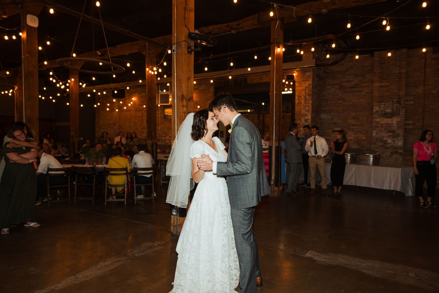 Bride and Groom dancing at The Startup Building photography by Av Potter Photo a Utah wedding and lifestyle photographer