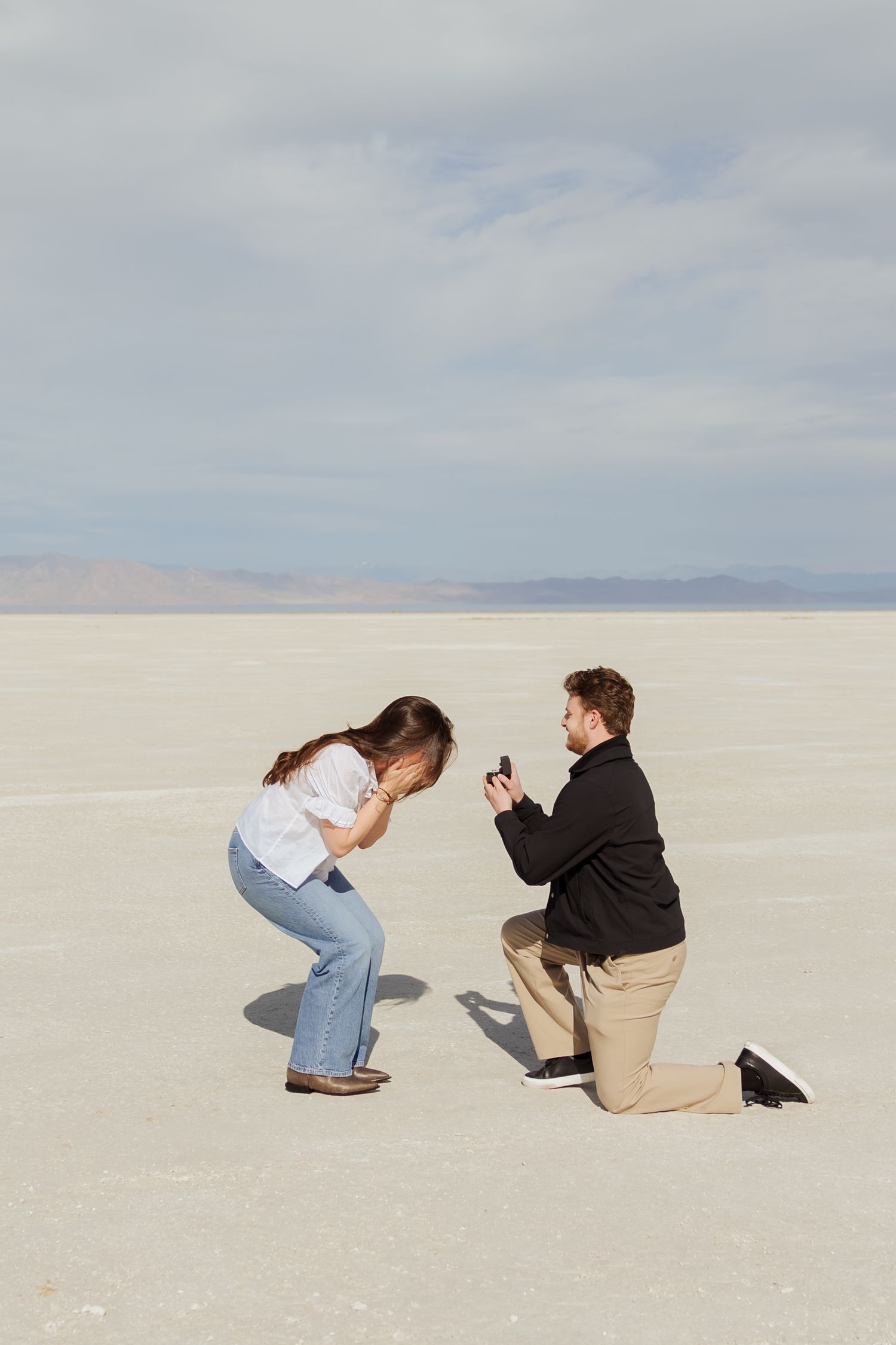 Helicopter proposal at Stansbury Island in Utah photography by Av Potter Photo a Utah wedding and lifestyle photographer