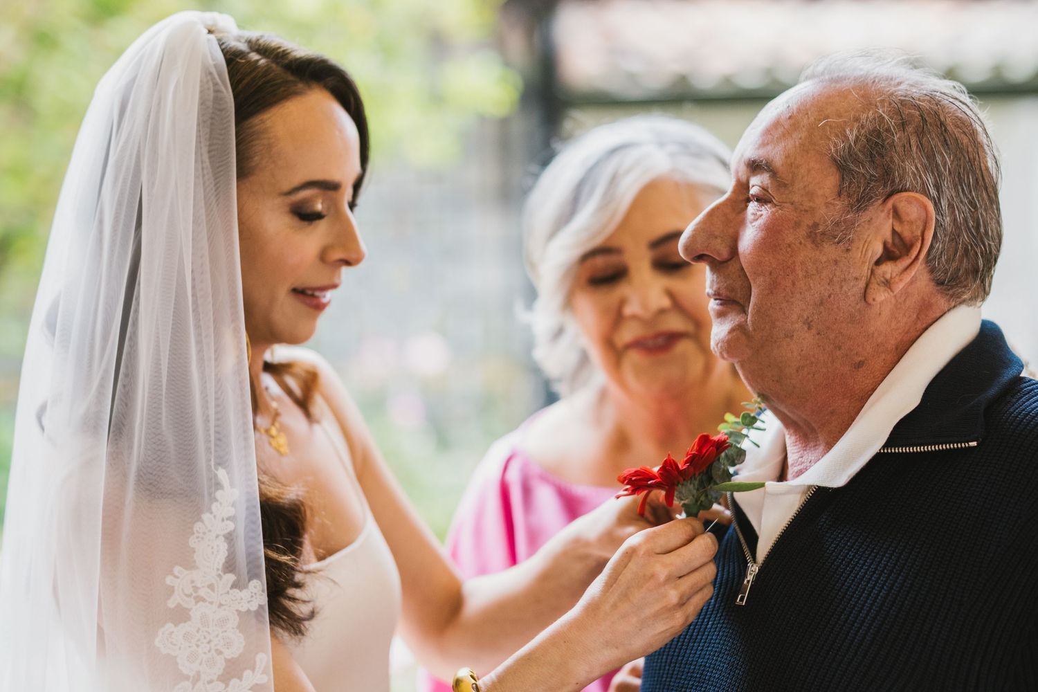 A series of candid wedding moments captured in five side-by-side photos showing emotional embraces and celebrations.