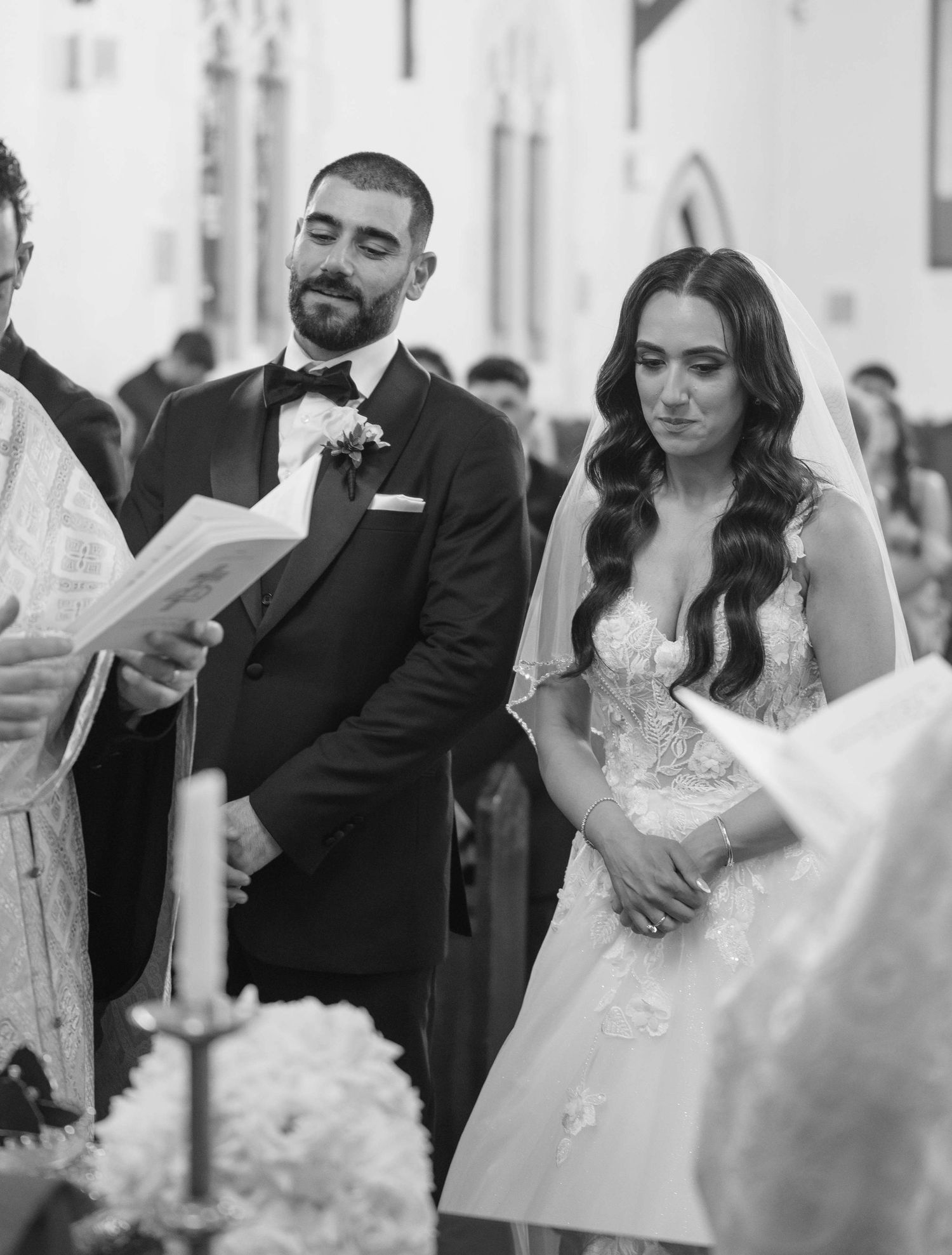 Black and white wedding reception photo sequence showing a couple during their first dance in an elegant venue.