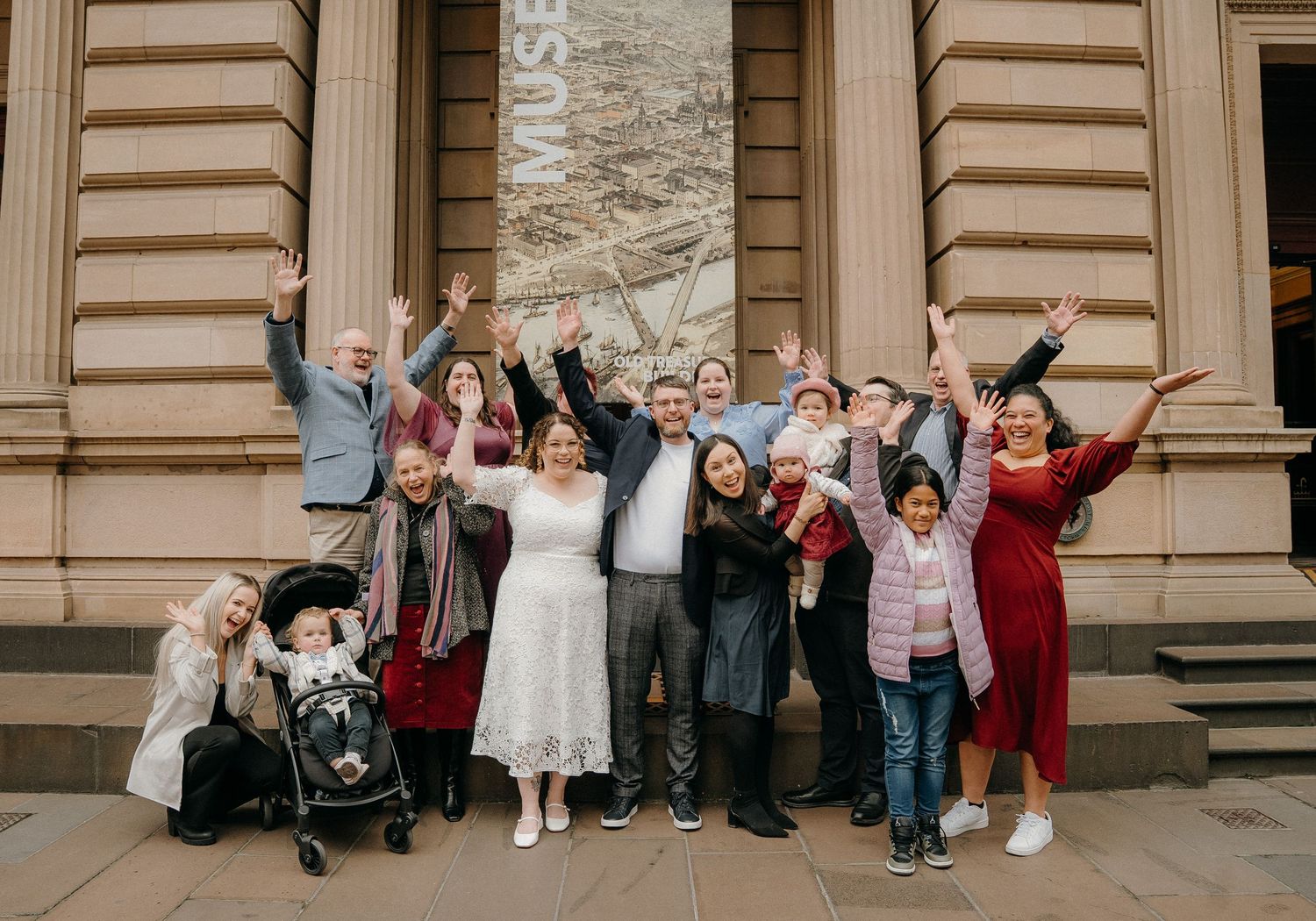 A series of five wedding party photos showing guests posing on grand stone steps outside a formal building.