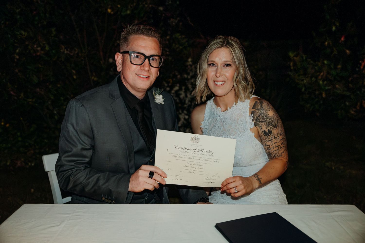 A couple at a formal event poses with documents and certificates in a series of celebratory photos.
