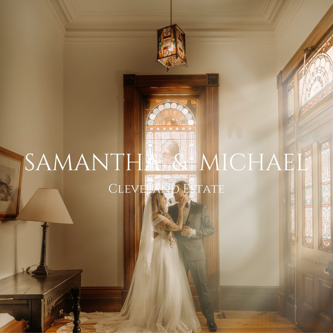 Elegant vintage-style wedding portrait in sunlit room with ornate doorway.