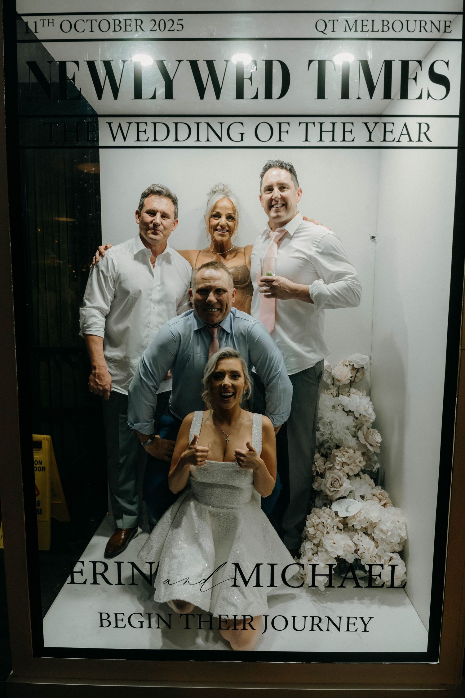 Wedding magazine cover mockup showing a group posing together in formal attire with 'Newlywed Times' masthead.