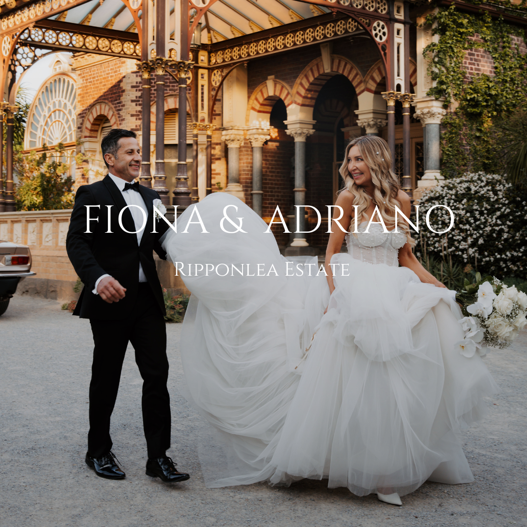 A couple in wedding attire pose together under ornate stone archways and wooden beams at Ripponlea Estate.