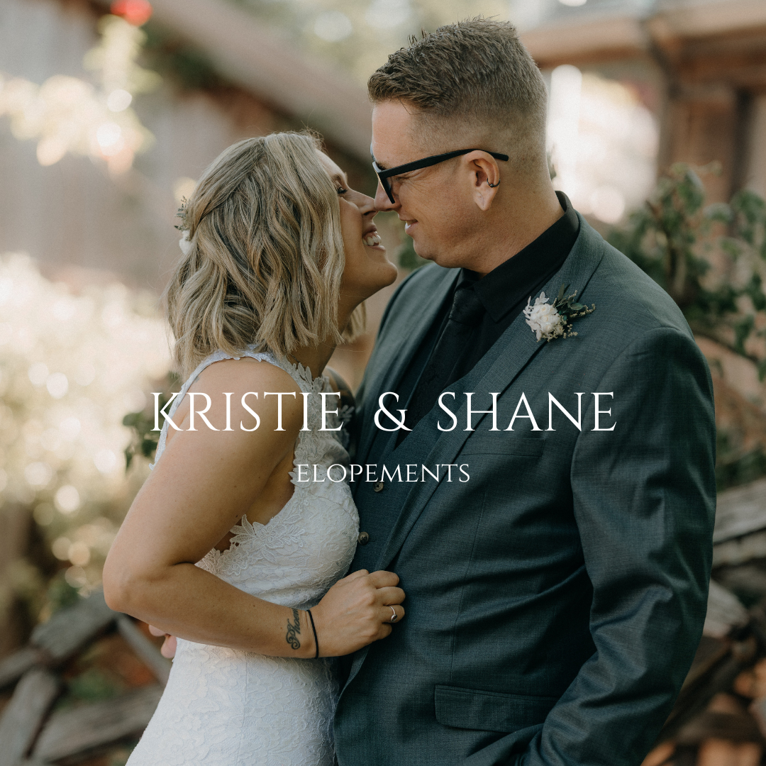 Romantic couple sharing intimate moments during an elopement wedding ceremony in a dreamy outdoor setting.