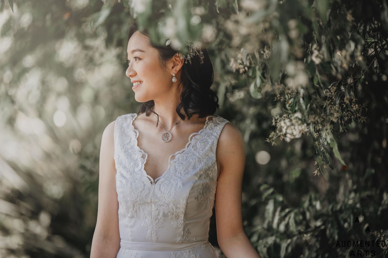 A dreamy bridal portrait with soft natural lighting and delicate lace details.