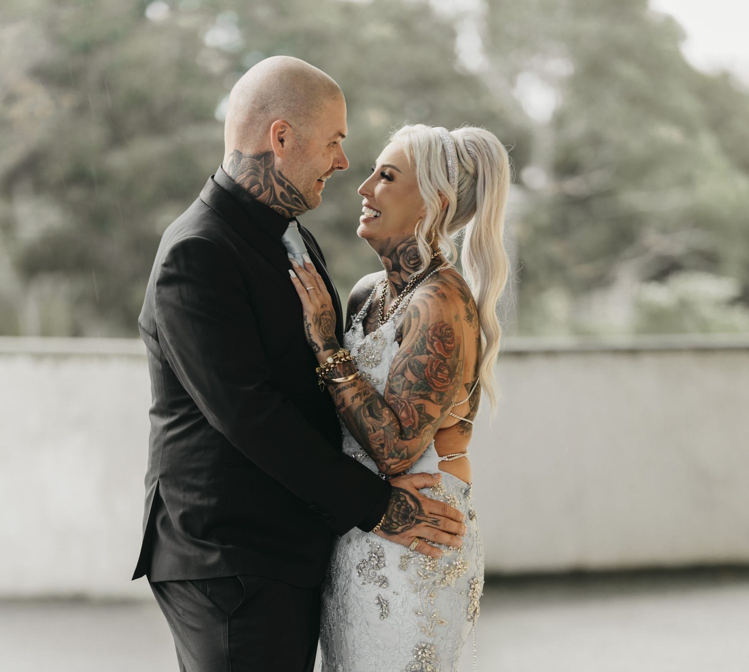 A romantic monochrome wedding photo sequence shows a couple sharing an intimate moment in classic formal attire.