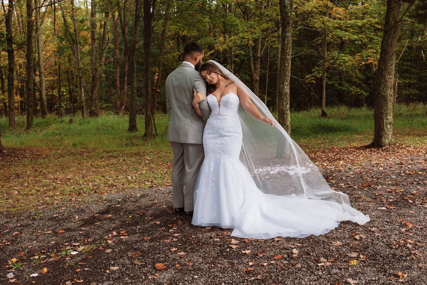 Hudson Valley photographer captures an intimate moment with bride and groom just after an autumn micro wedding ceremony outdoors