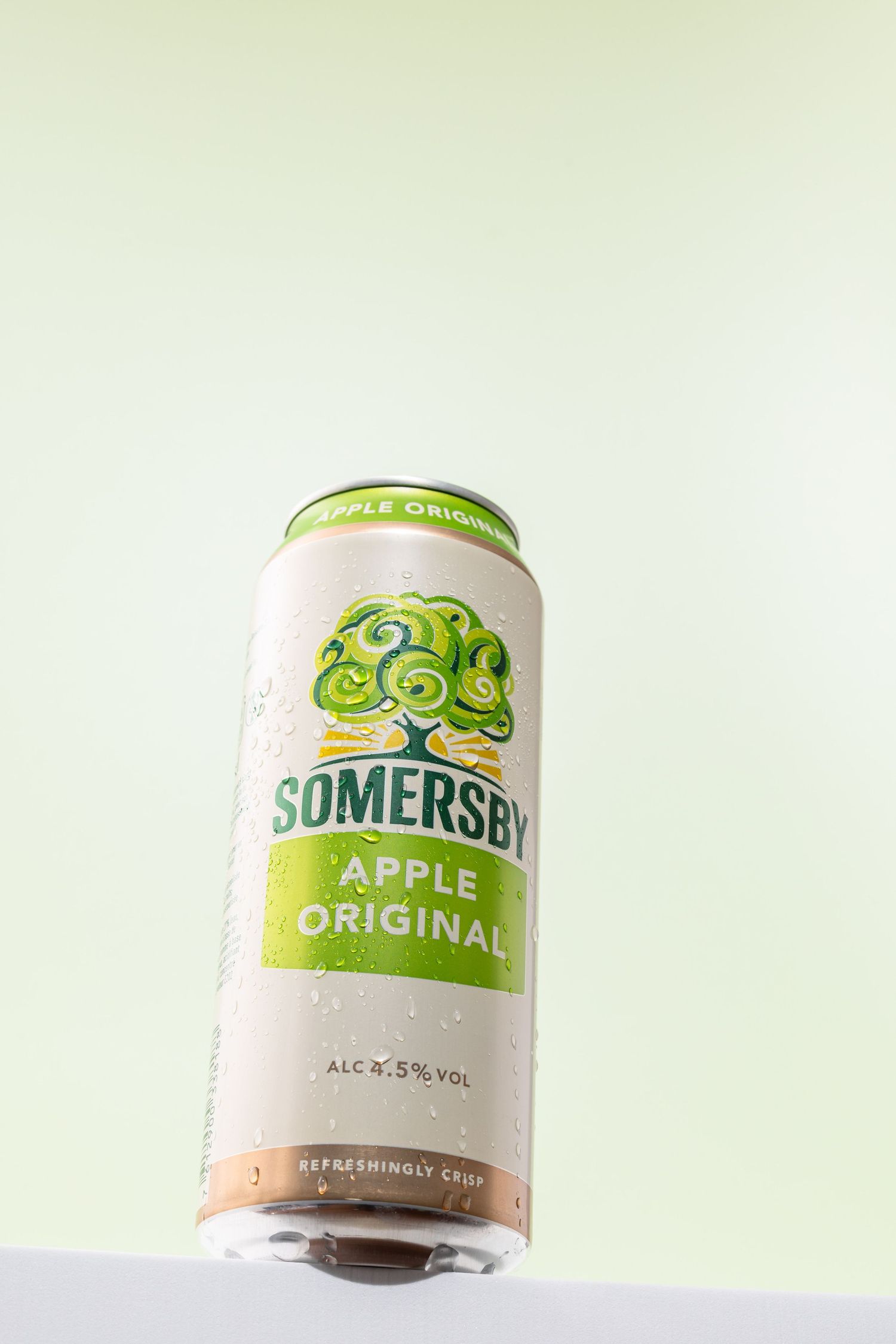 Three cans of Somersby apple cider shown at different angles against a light background.
