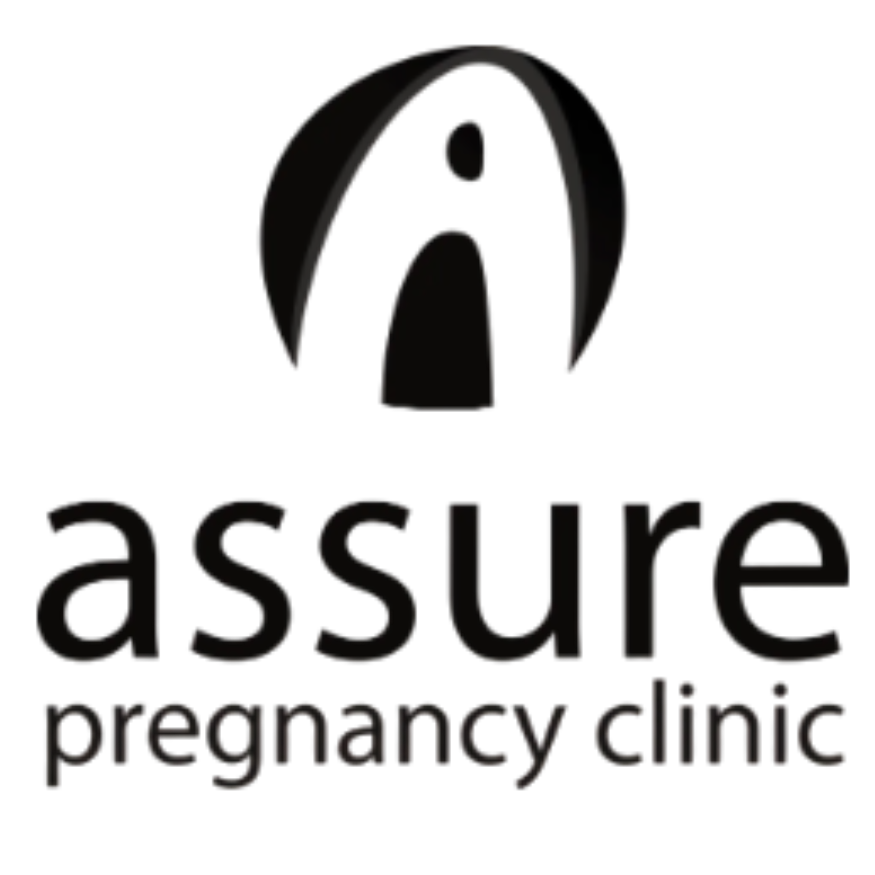 A blurred logo for a pregnancy clinic with dark text against a light background.