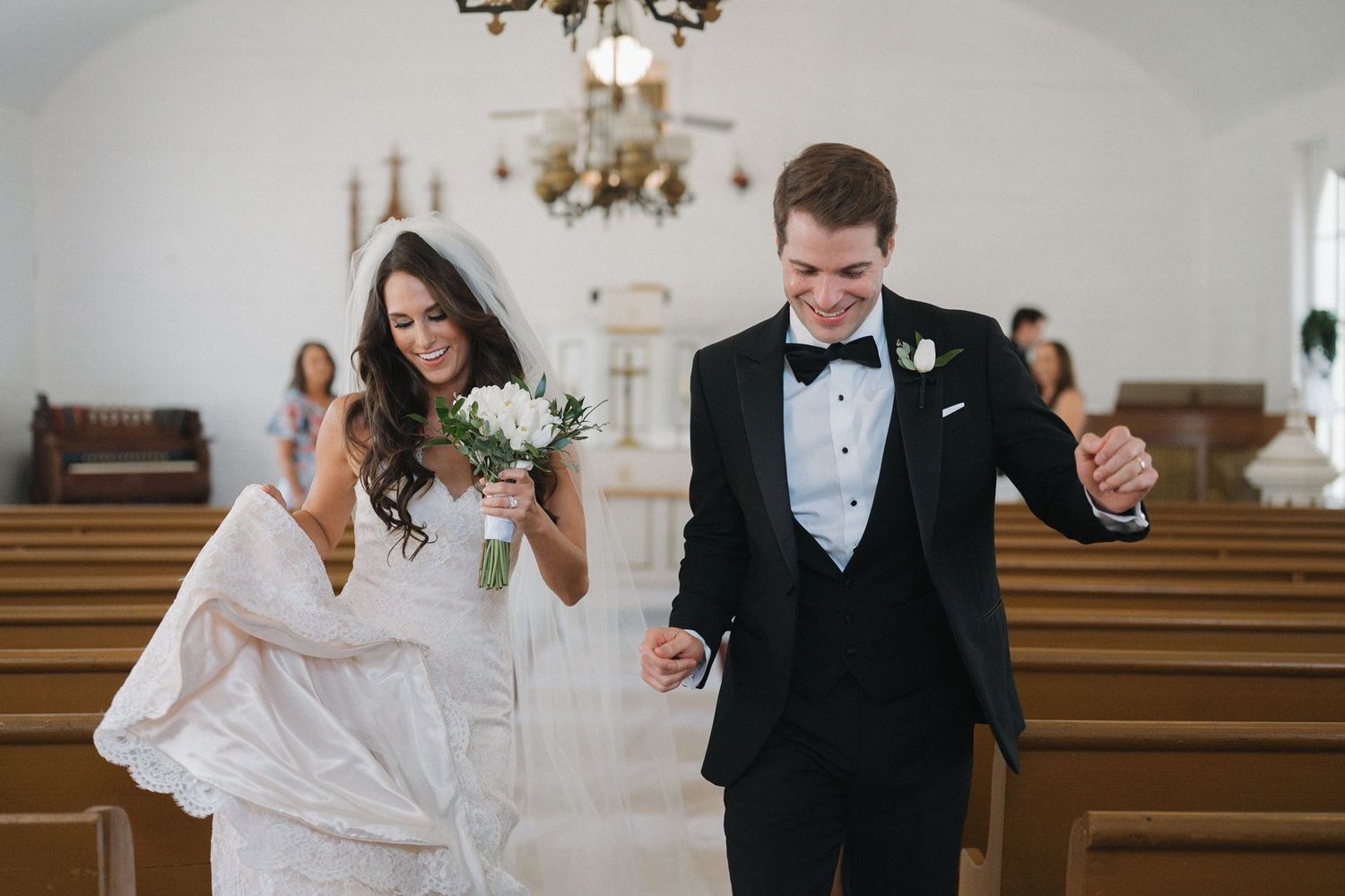 An image of a bride and groom dancing, taken by photographer near The Woodlands, Tx.
