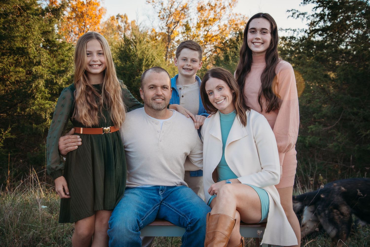 Outdoor family session at golden hour on a Kentucky farm. Natural light, candid moments, and heartfelt connection captured beautifully.