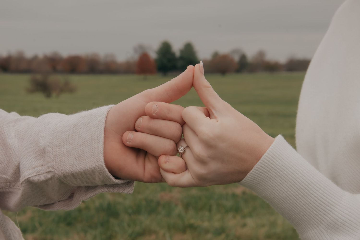 Outdoor engagement photo in natural light. Kentucky lifestyle photographer captures candid love and joyful connection.