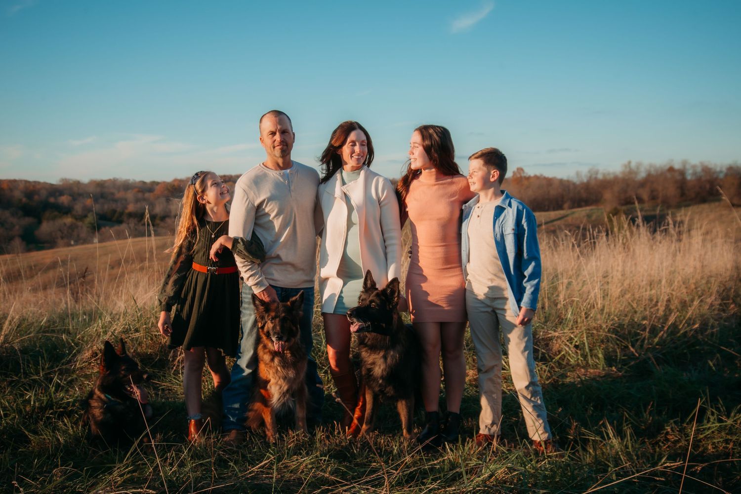 Outdoor family session at golden hour on a Kentucky farm. Natural light, candid moments, and heartfelt connection captured beautifully.