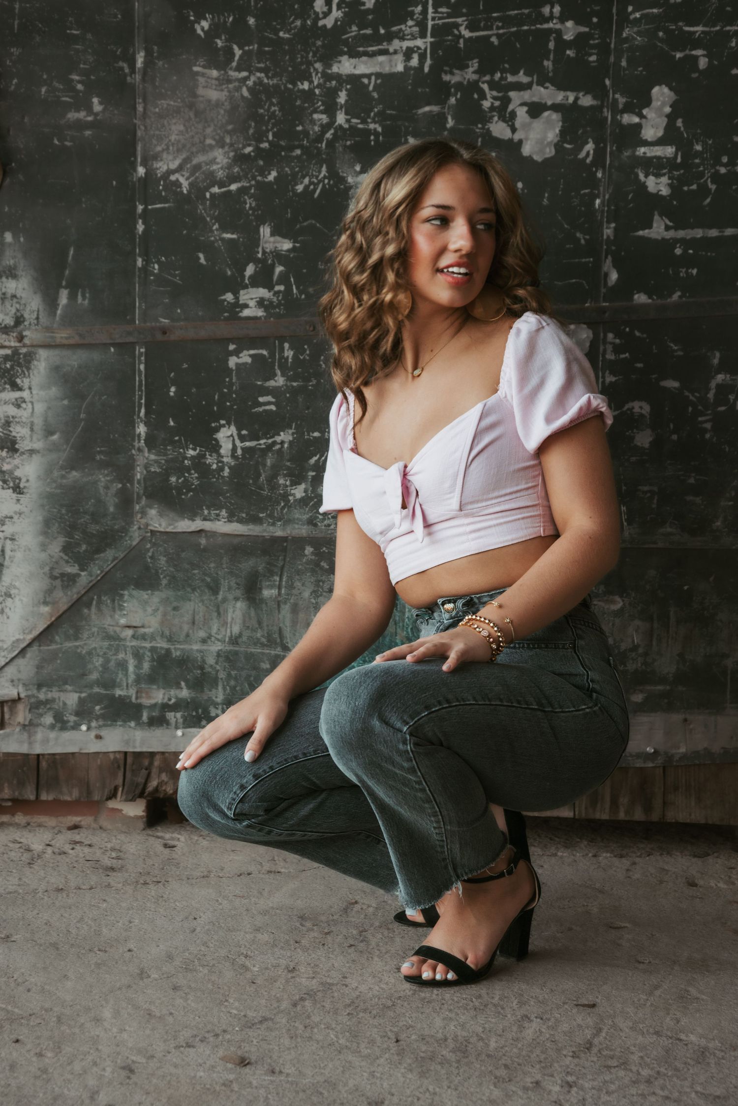 Urban senior portrait with bold style and natural light. Kentucky lifestyle photographer captures personality and city vibes.