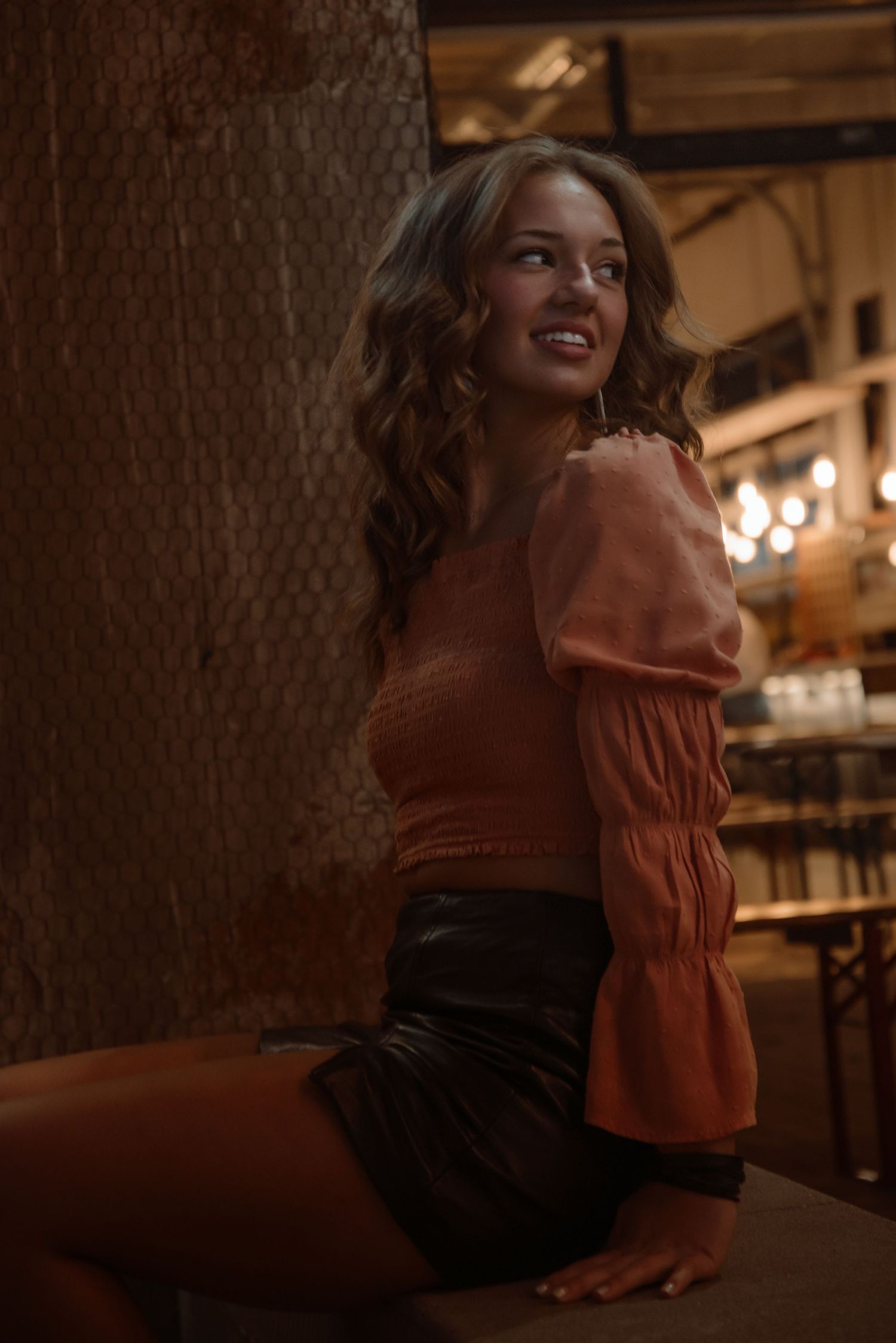 Urban senior portrait with bold style and natural light. Kentucky lifestyle photographer captures personality and city vibes.