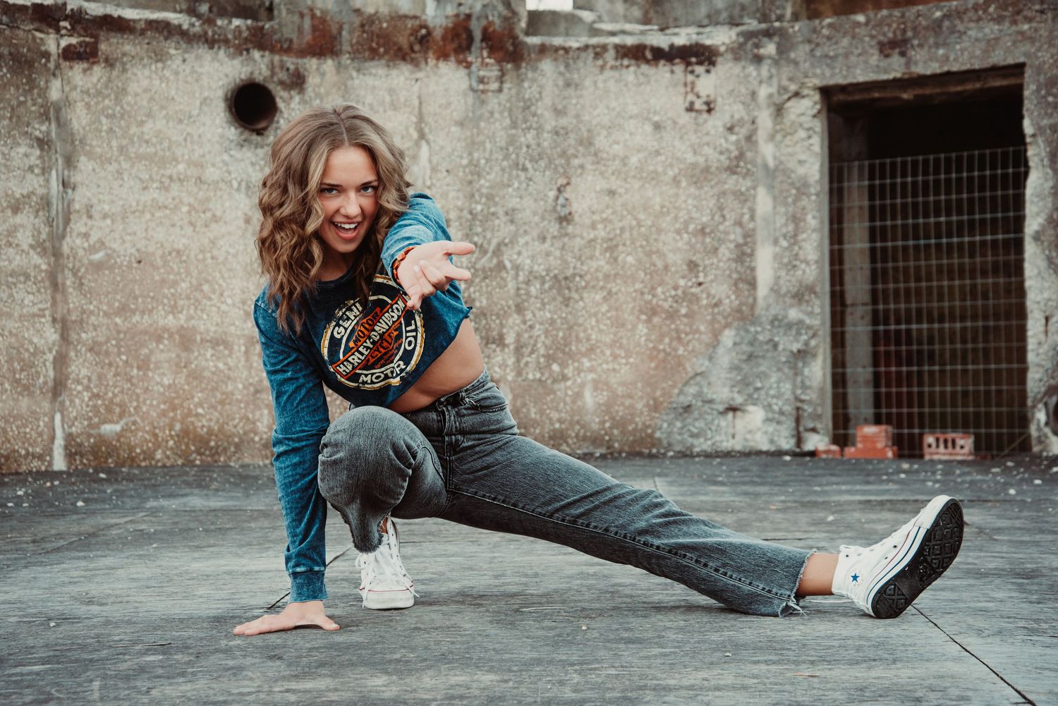 Urban senior portrait with bold style and natural light. Kentucky lifestyle photographer captures personality and city vibes.
