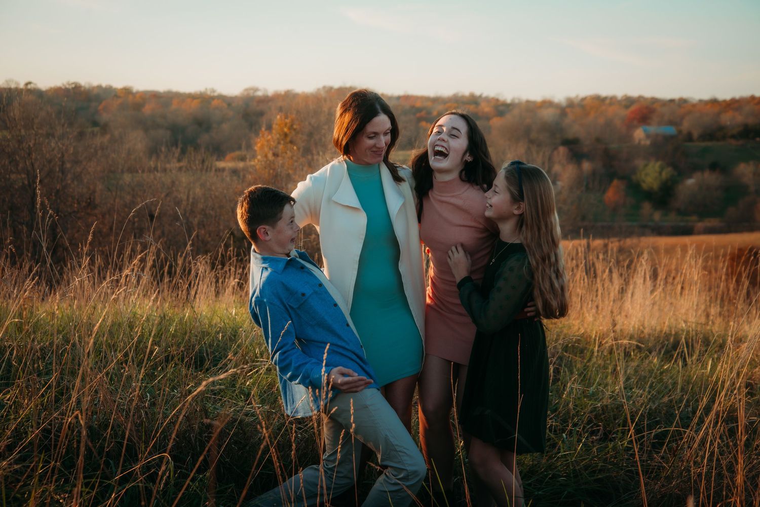 Outdoor family session at golden hour on a Kentucky farm. Natural light, candid moments, and heartfelt connection captured beautifully.