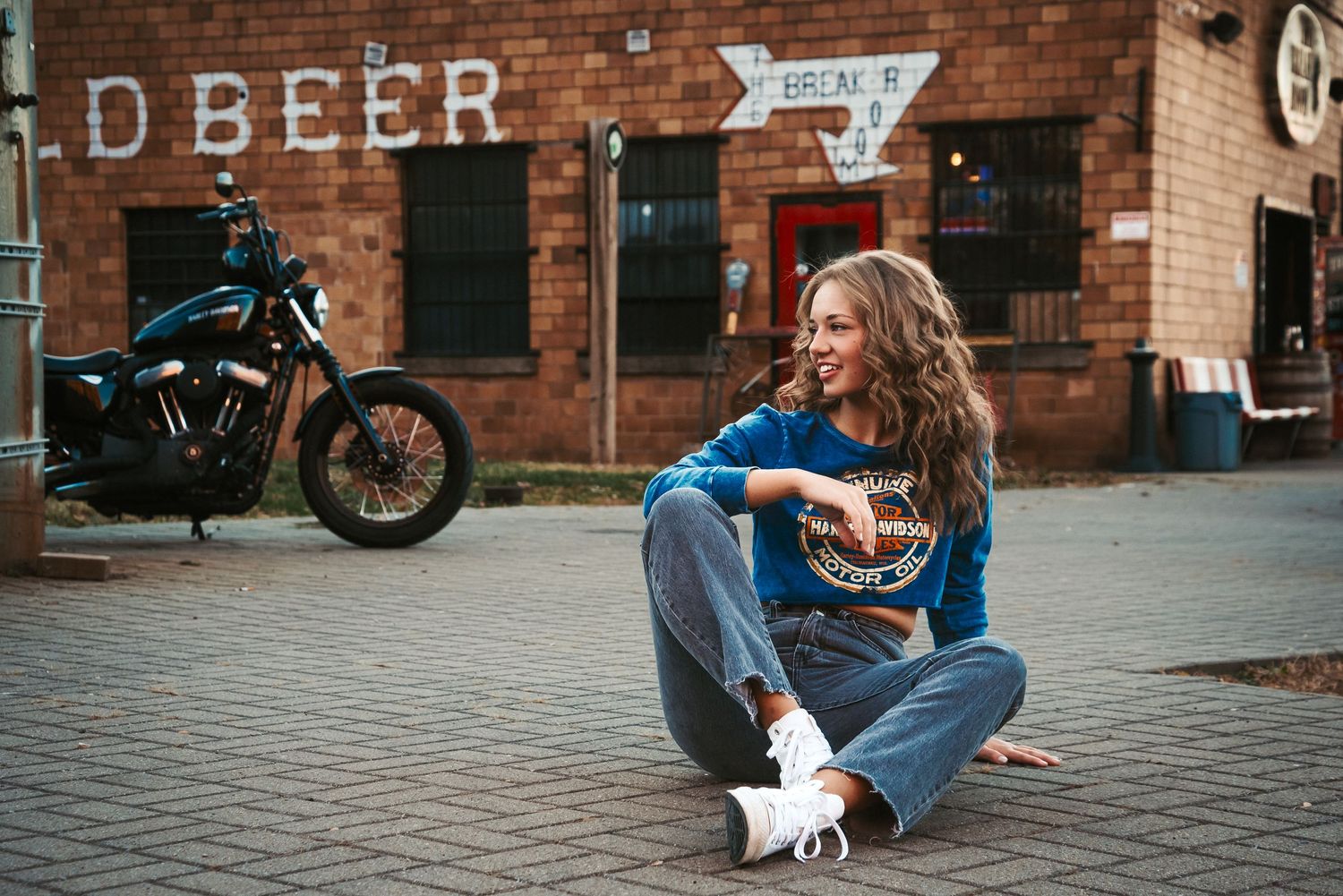 Urban senior portrait with bold style and natural light. Kentucky lifestyle photographer captures personality and city vibes.