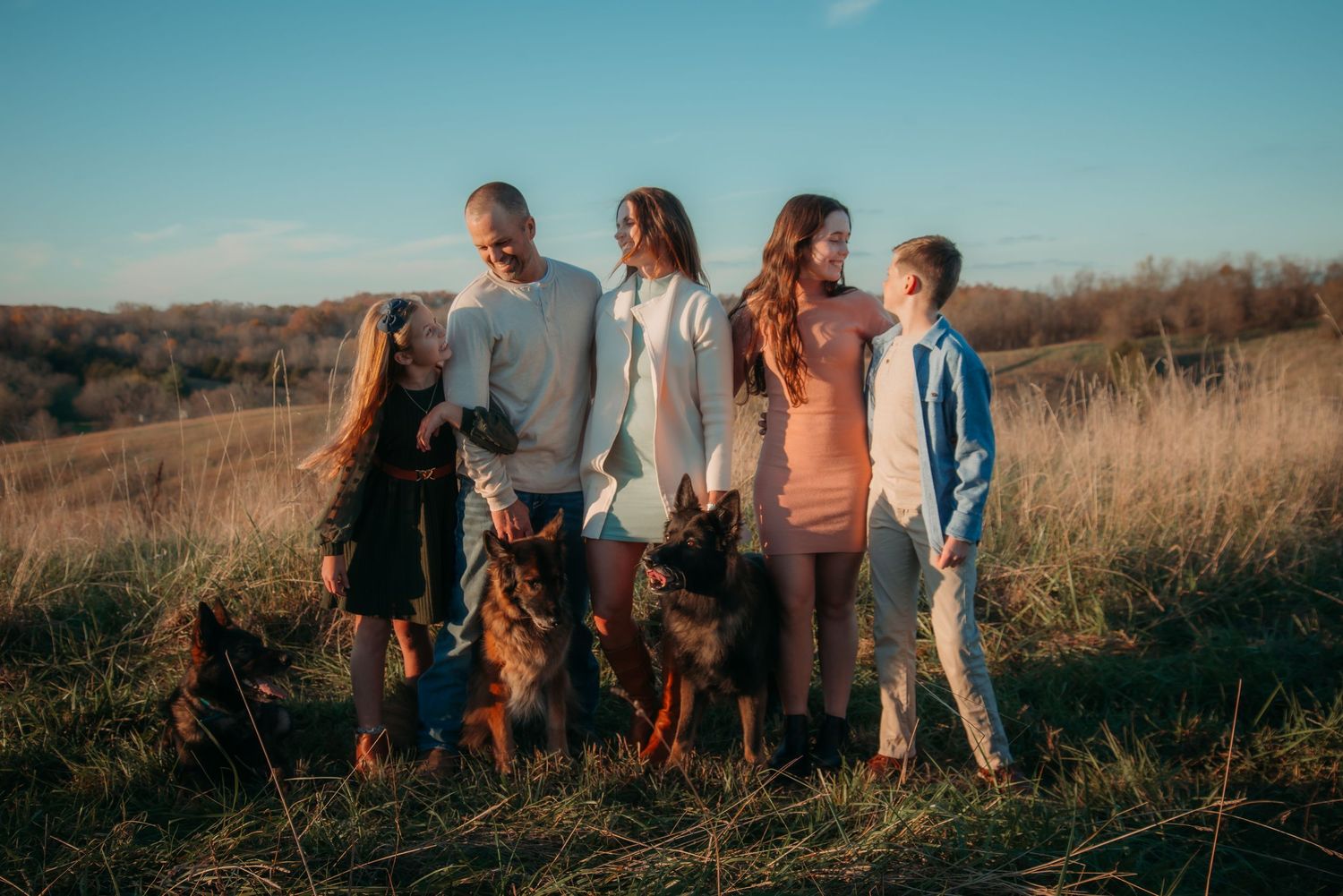 Outdoor family session at golden hour on a Kentucky farm. Natural light, candid moments, and heartfelt connection captured beautifully.