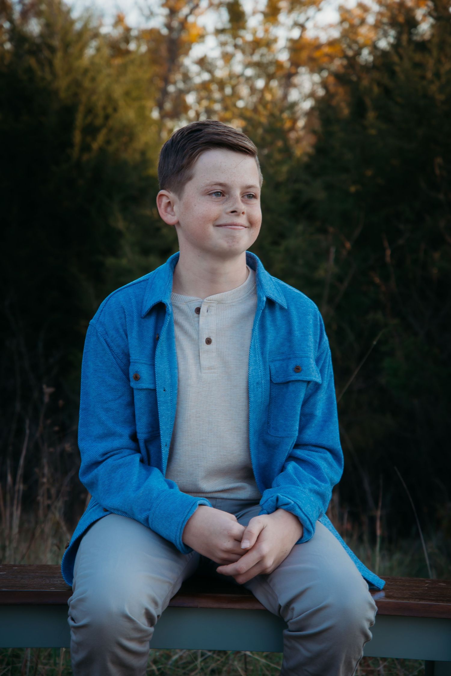 Outdoor family session at golden hour on a Kentucky farm. Natural light, candid moments, and heartfelt connection captured beautifully.