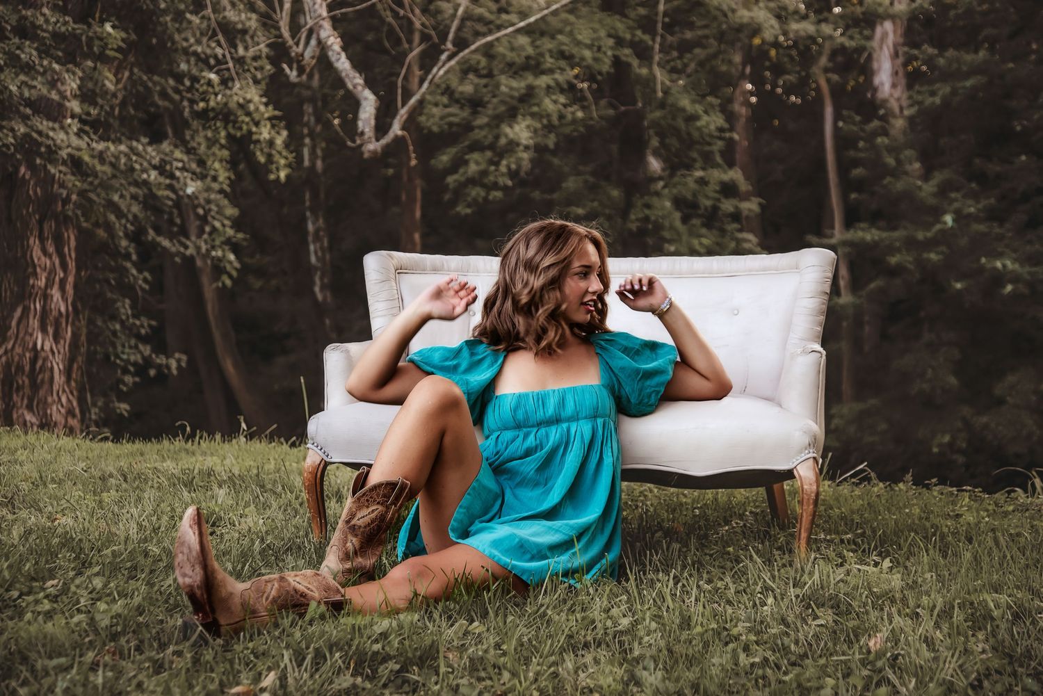 Playful senior portrait in nature at golden hour. Kentucky lifestyle photographer captures joy, personality, and warm natural light.