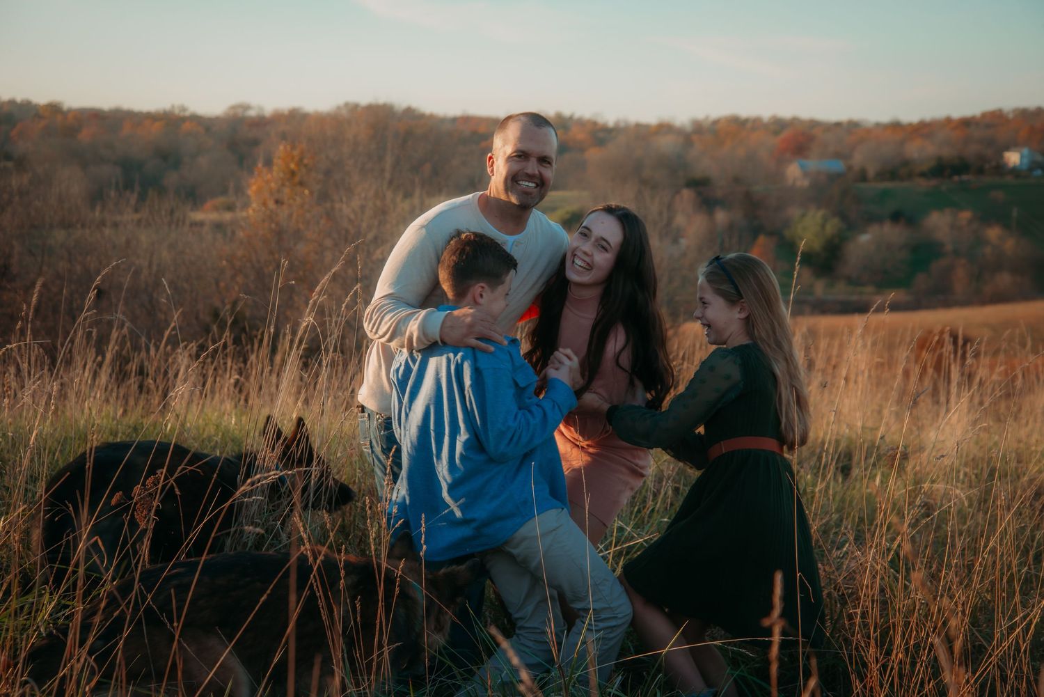 Outdoor family session at golden hour on a Kentucky farm. Natural light, candid moments, and heartfelt connection captured beautifully.