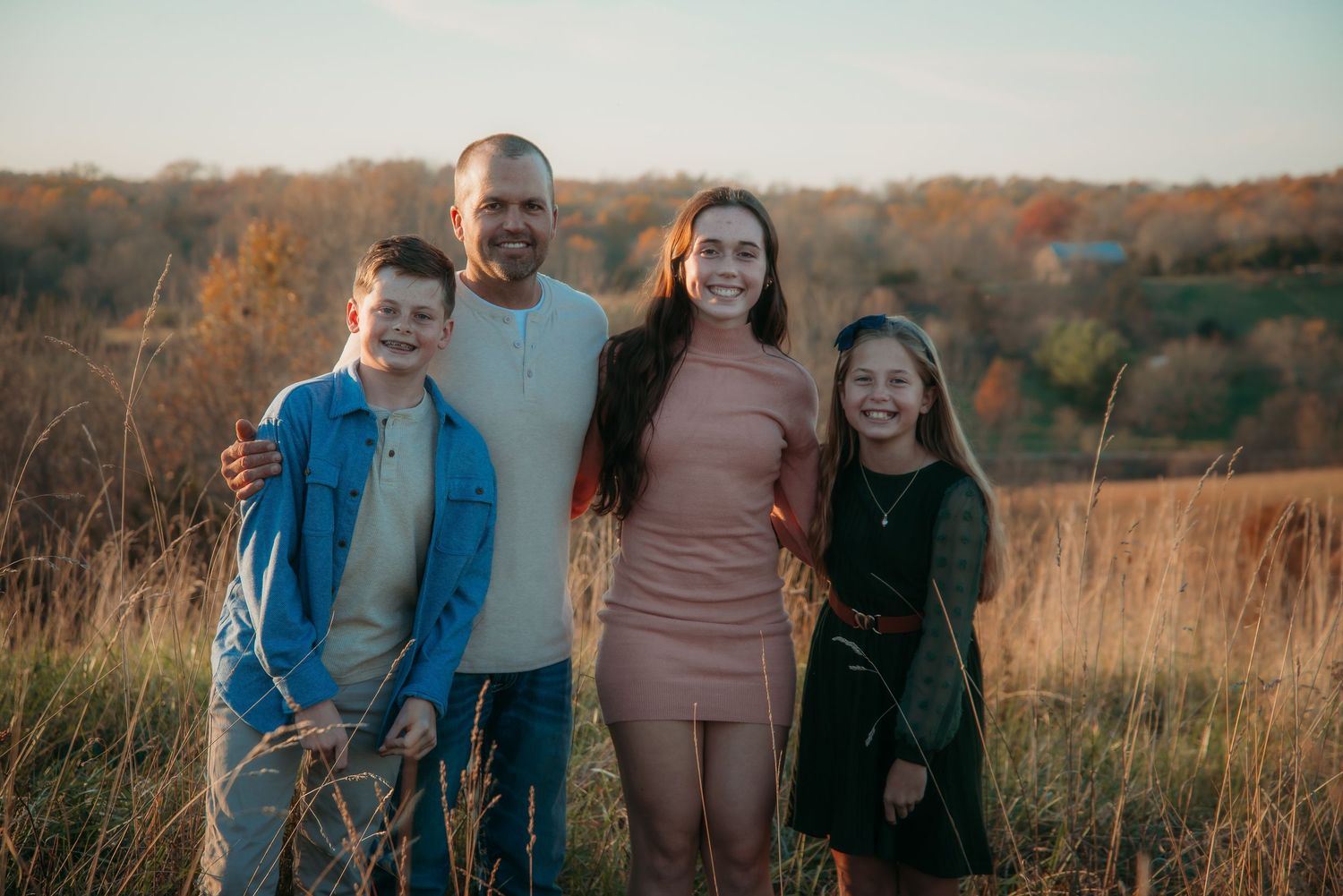Outdoor family session at golden hour on a Kentucky farm. Natural light, candid moments, and heartfelt connection captured beautifully.