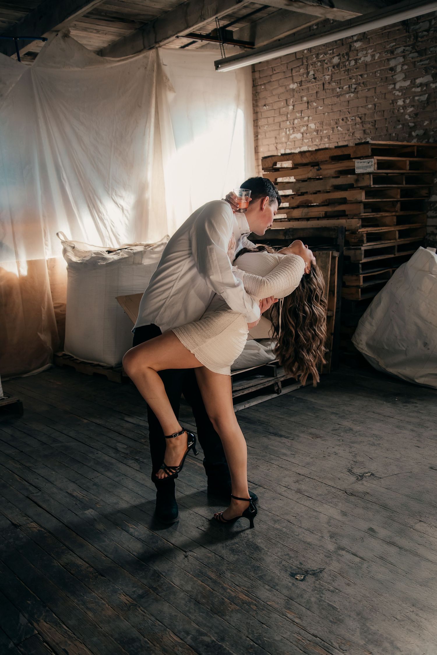 Indoor engagement photo with natural light. Kentucky lifestyle photographer captures candid love and cozy, heartfelt connection.