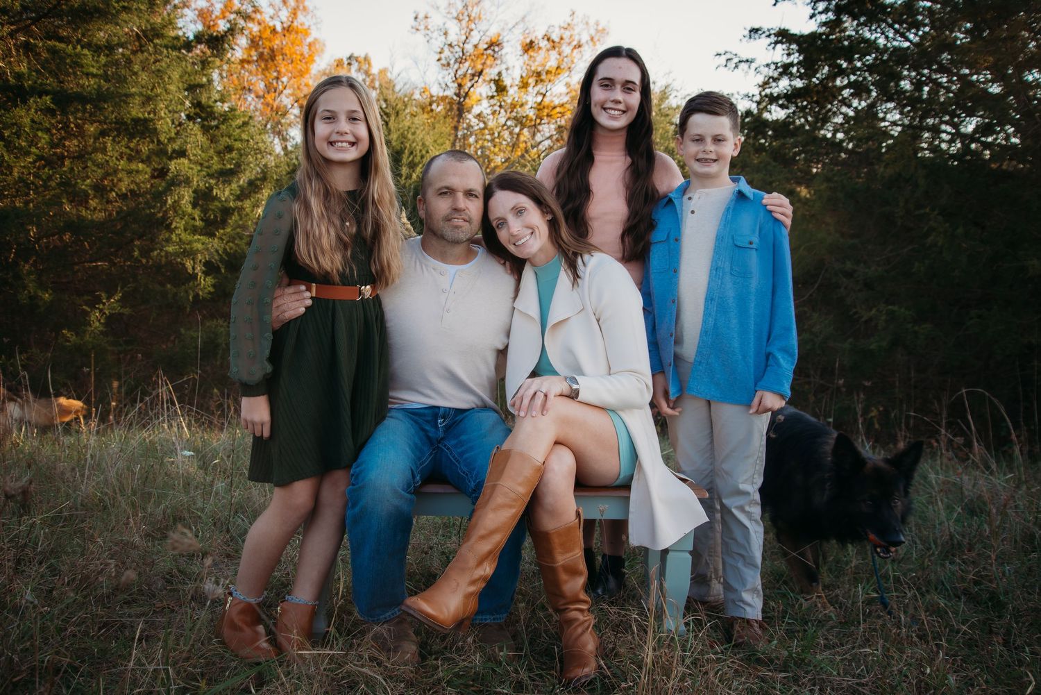 Outdoor family session at golden hour on a Kentucky farm. Natural light, candid moments, and heartfelt connection captured beautifully.