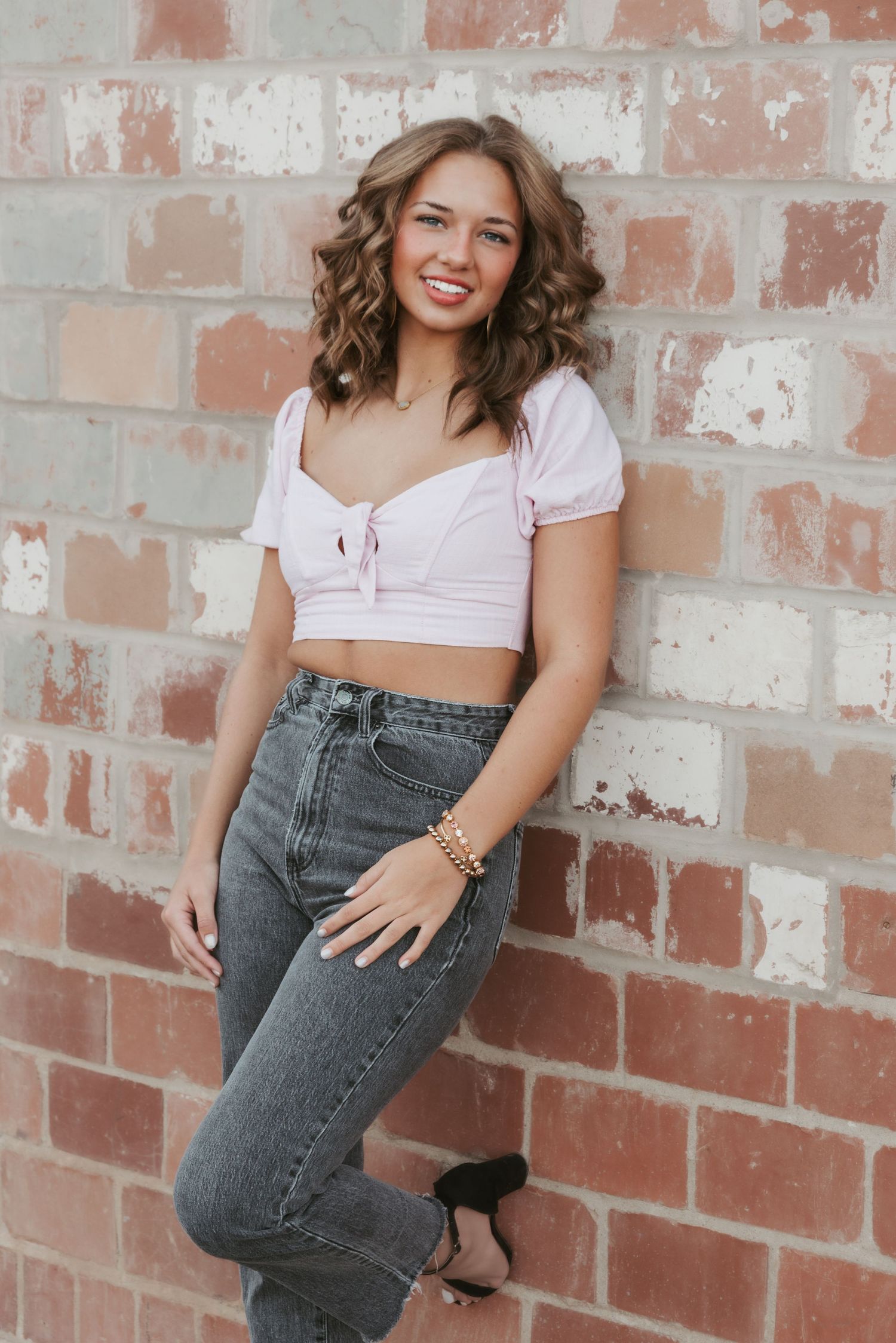 Urban senior portrait with bold style and natural light. Kentucky lifestyle photographer captures personality and city vibes.