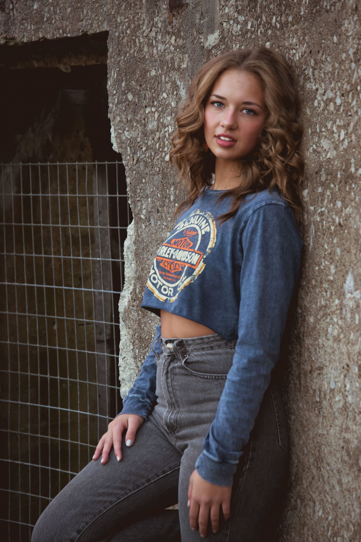 Urban senior portrait with bold style and natural light. Kentucky lifestyle photographer captures personality and city vibes.