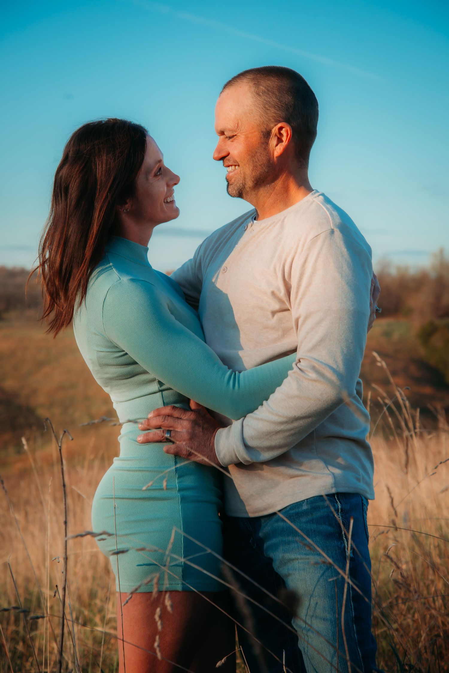 Outdoor family session at golden hour on a Kentucky farm. Natural light, candid moments, and heartfelt connection captured beautifully.