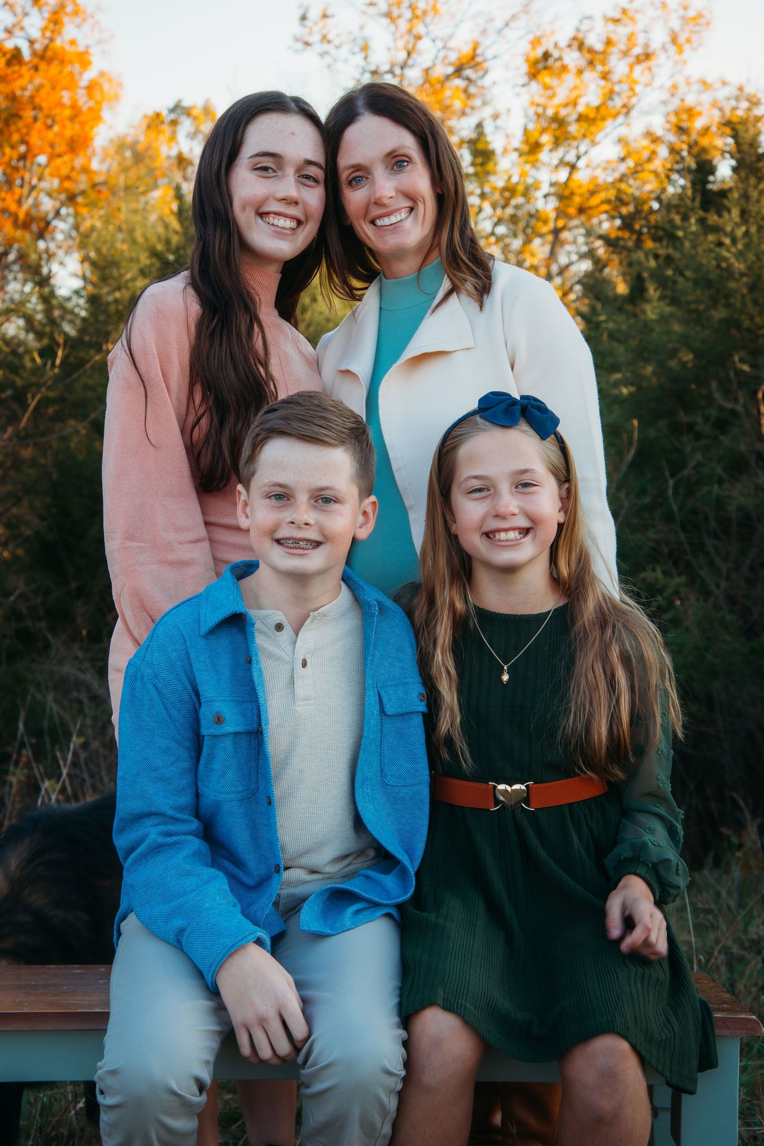Outdoor family session at golden hour on a Kentucky farm. Natural light, candid moments, and heartfelt connection captured beautifully.