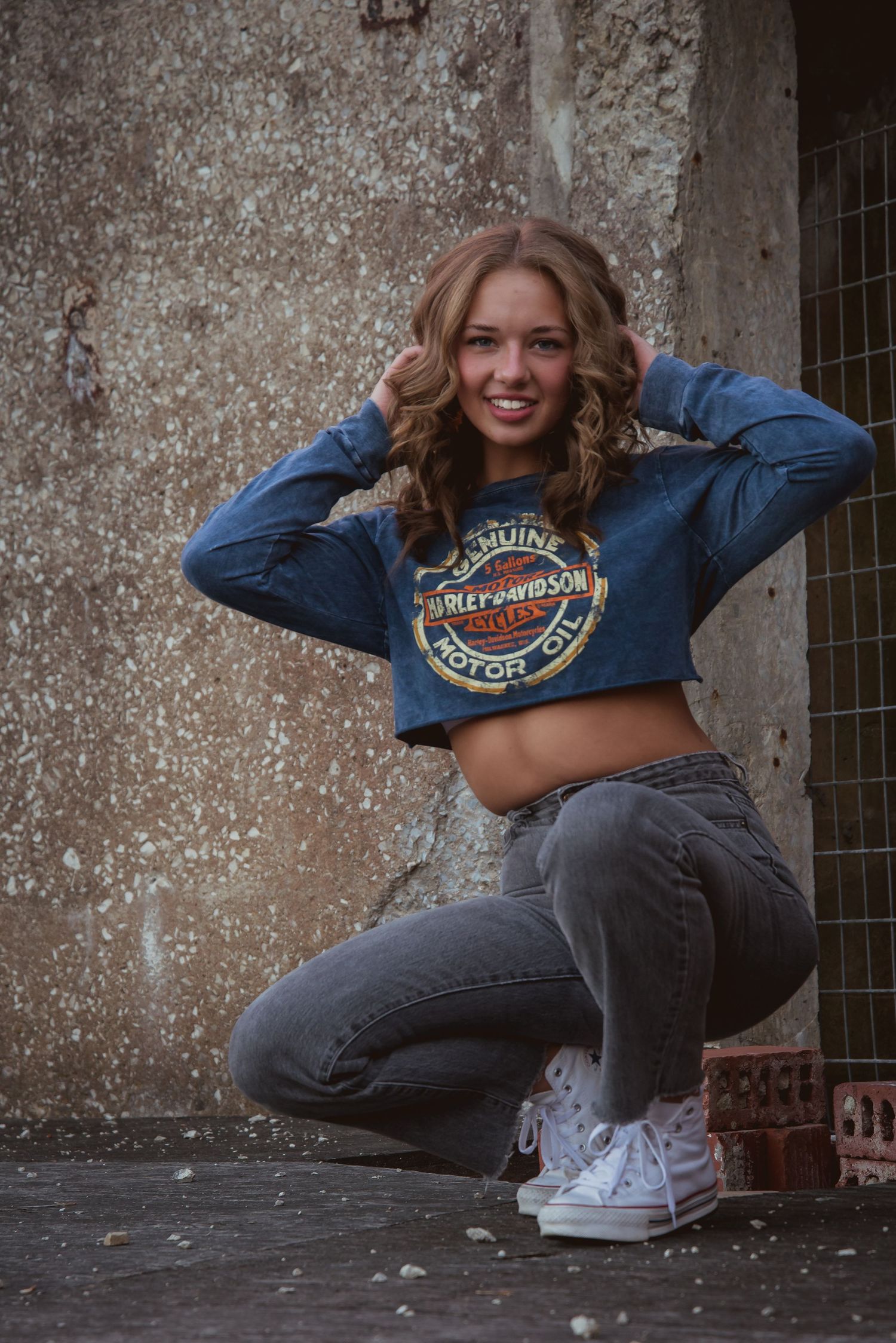Urban senior portrait with bold style and natural light. Kentucky lifestyle photographer captures personality and city vibes.