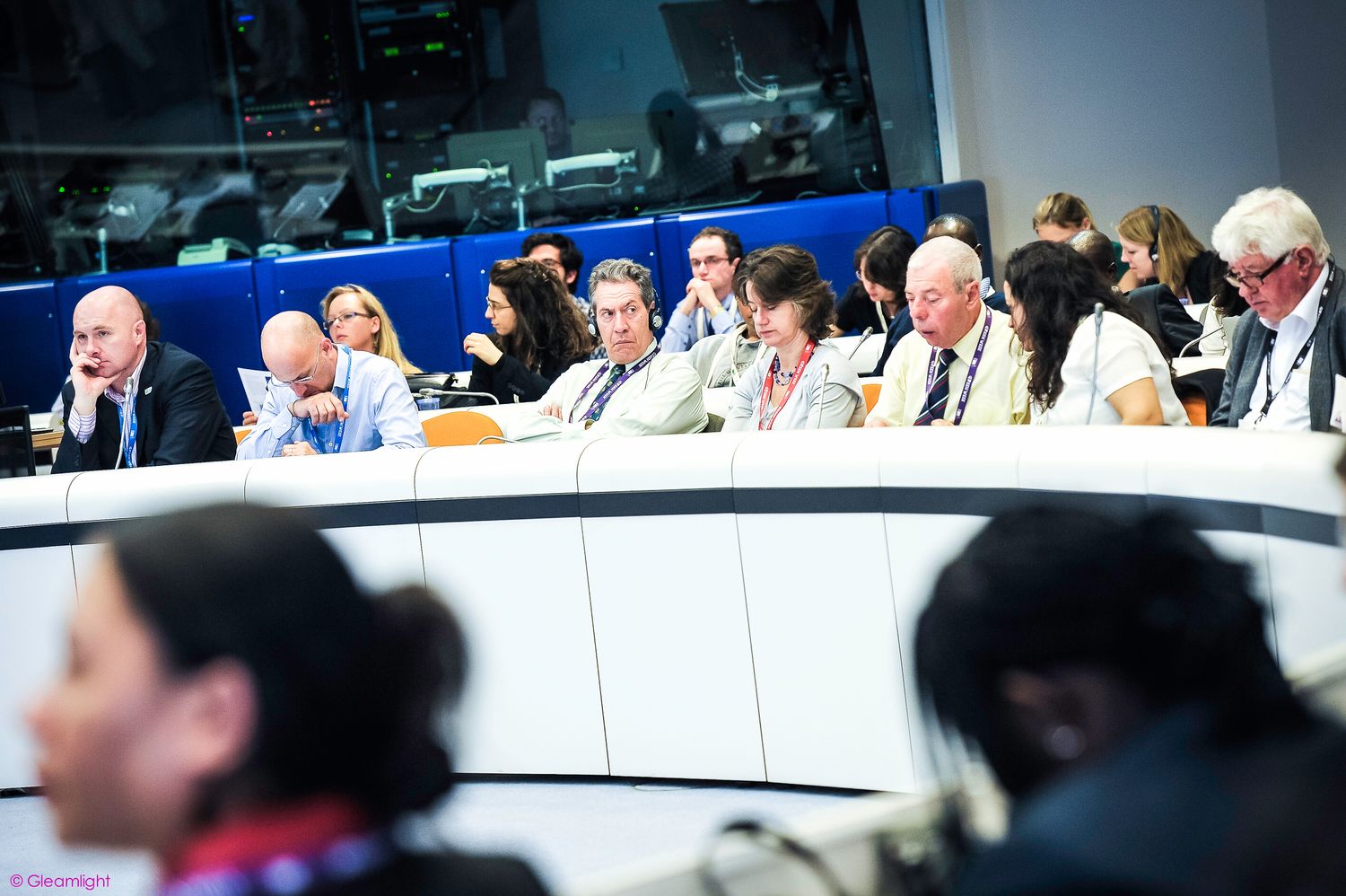 Wide shot of attendees at European Parliament committee meeting.