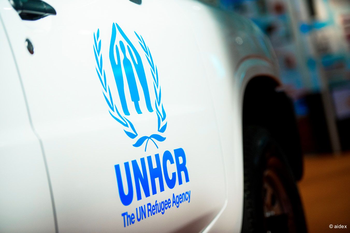 UNHCR logo displayed on a white surface with blue text and emblem.
