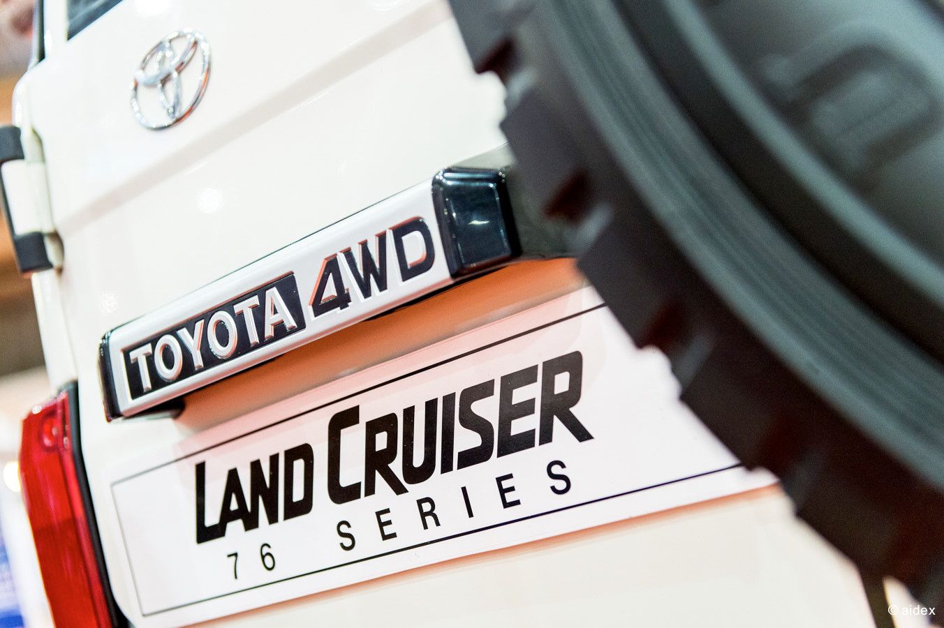 Close-up of a Toyota Land Cruiser 70 Series badge and emblem.
