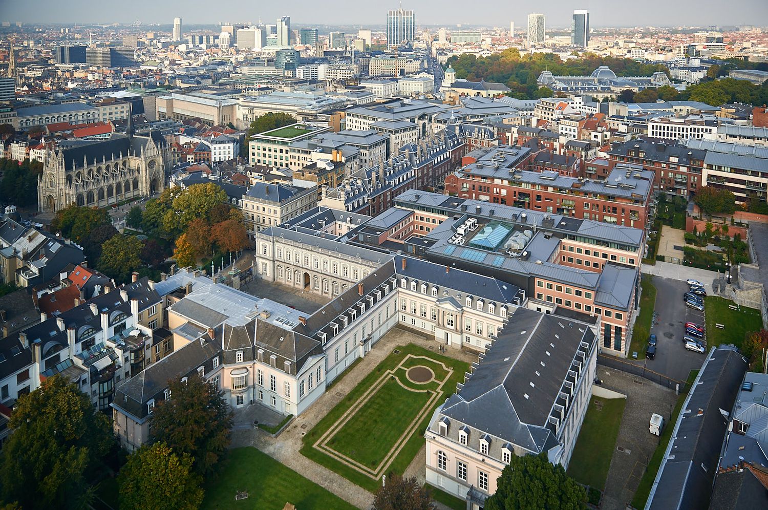 Aerial panoramic view of European city skyline with historic architecture.