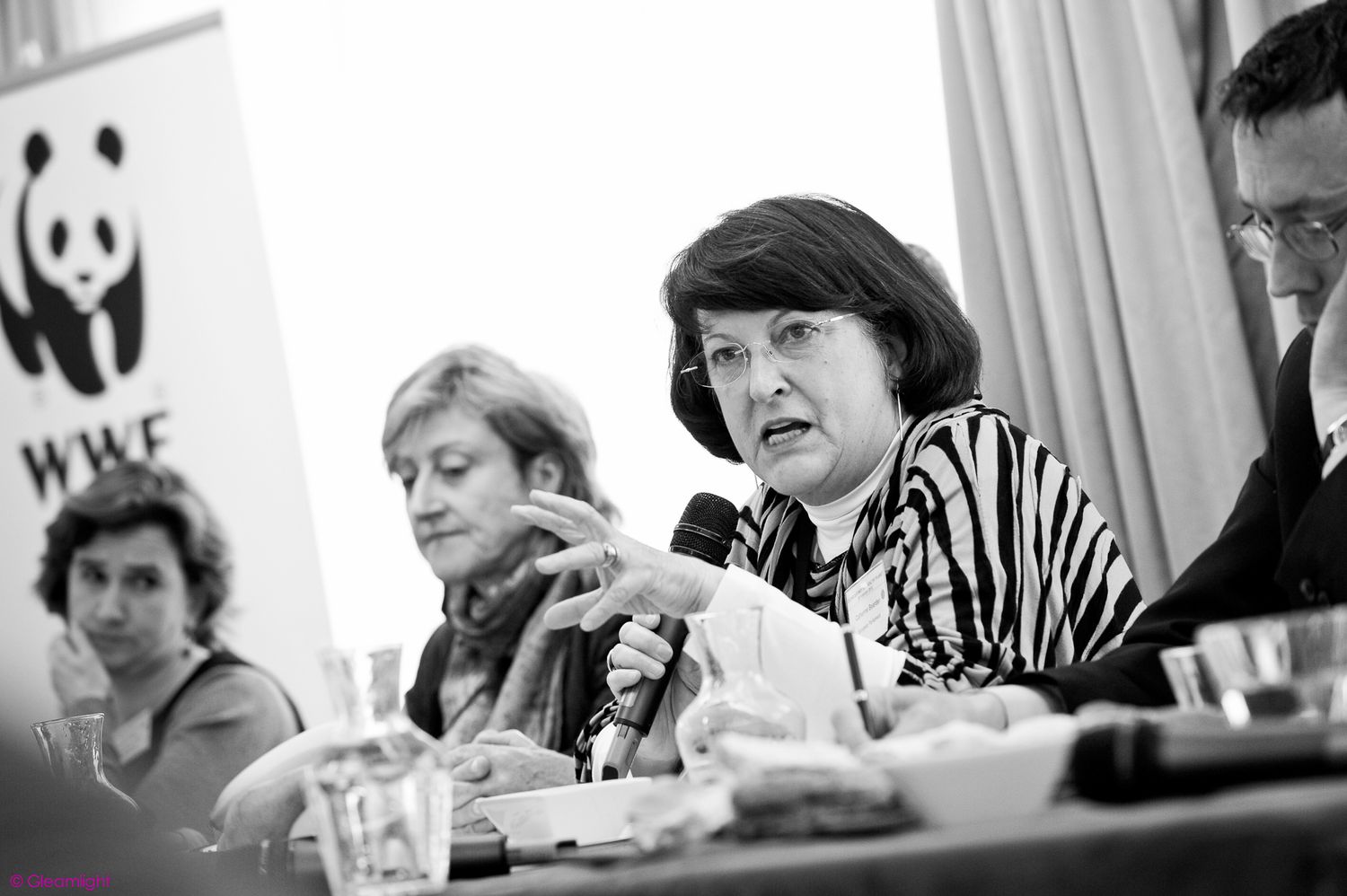 Black and white photo of attendees at a conference or meeting.