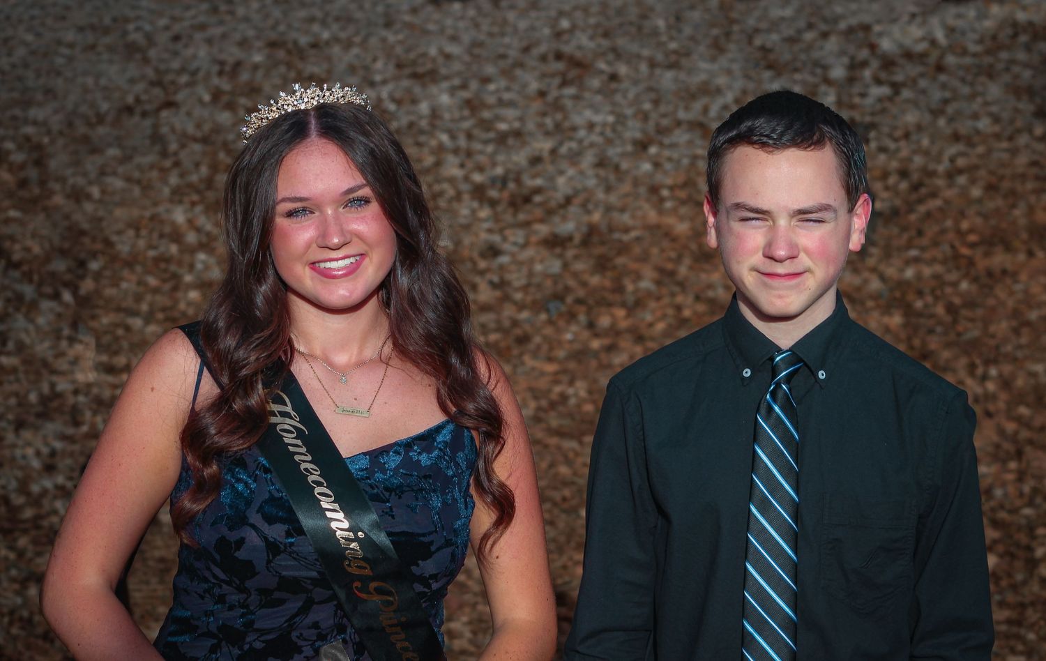Homecoming sibling portrait captured by L&C Moments Photography in McDonough, GA - session showing sibling smiles and special moments.