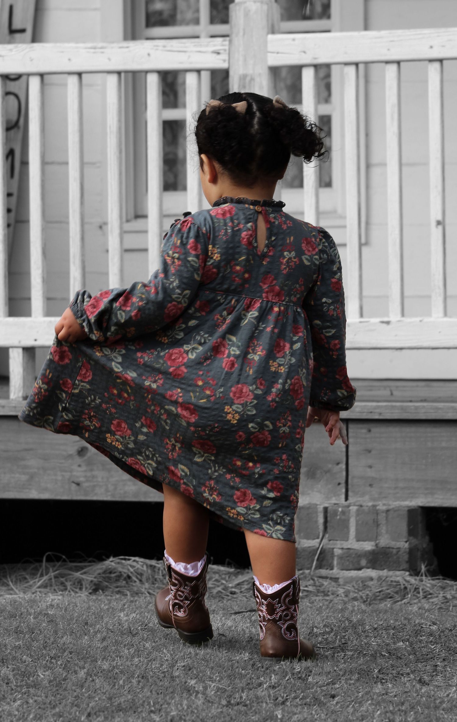 Portrait of a child looking away captured by L&C Moments in McDonough, Ga - highlighting natural poses and candid moments.