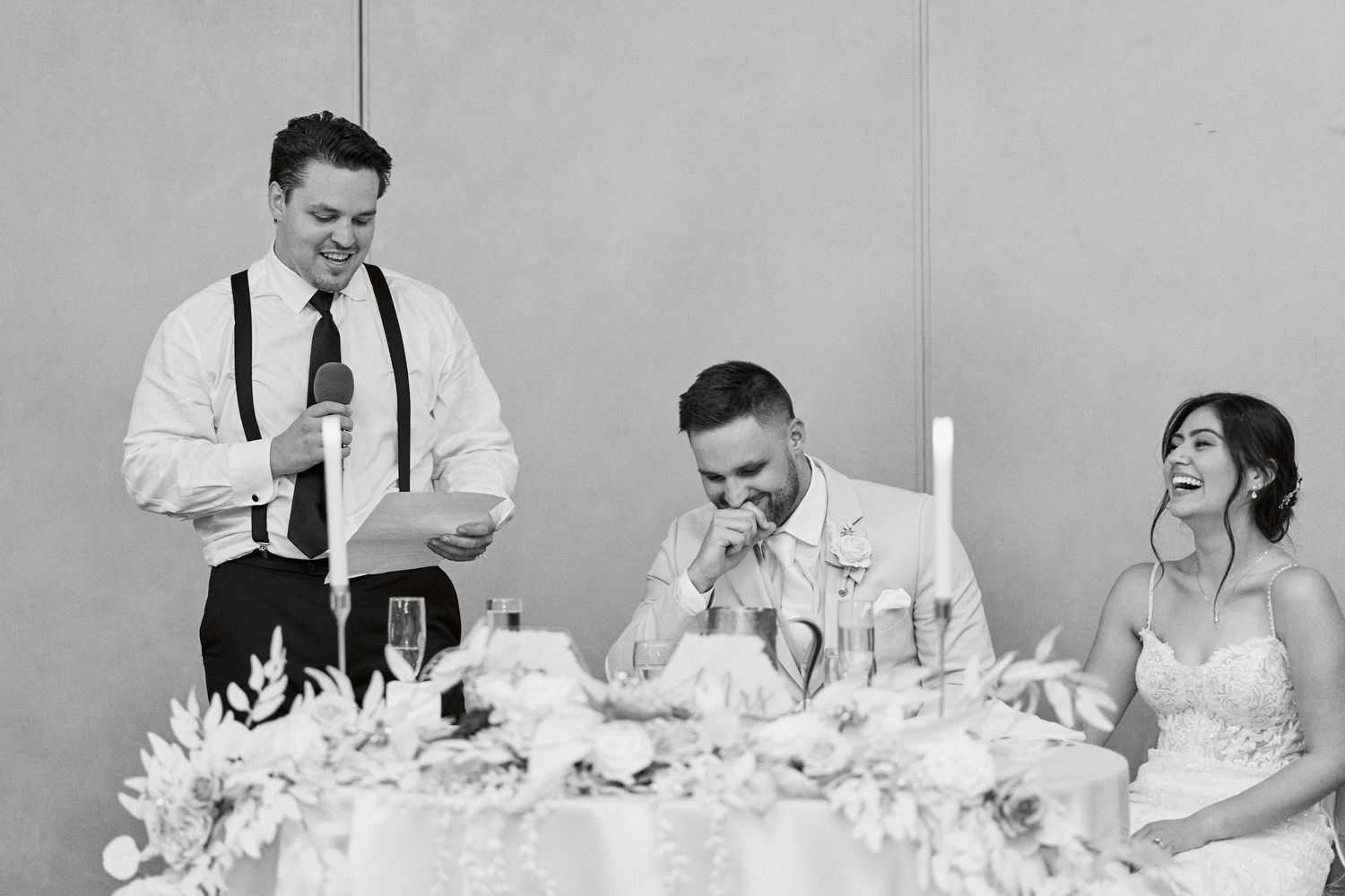 A black and white photo collage showing people at a formal dining event with table settings and candles.