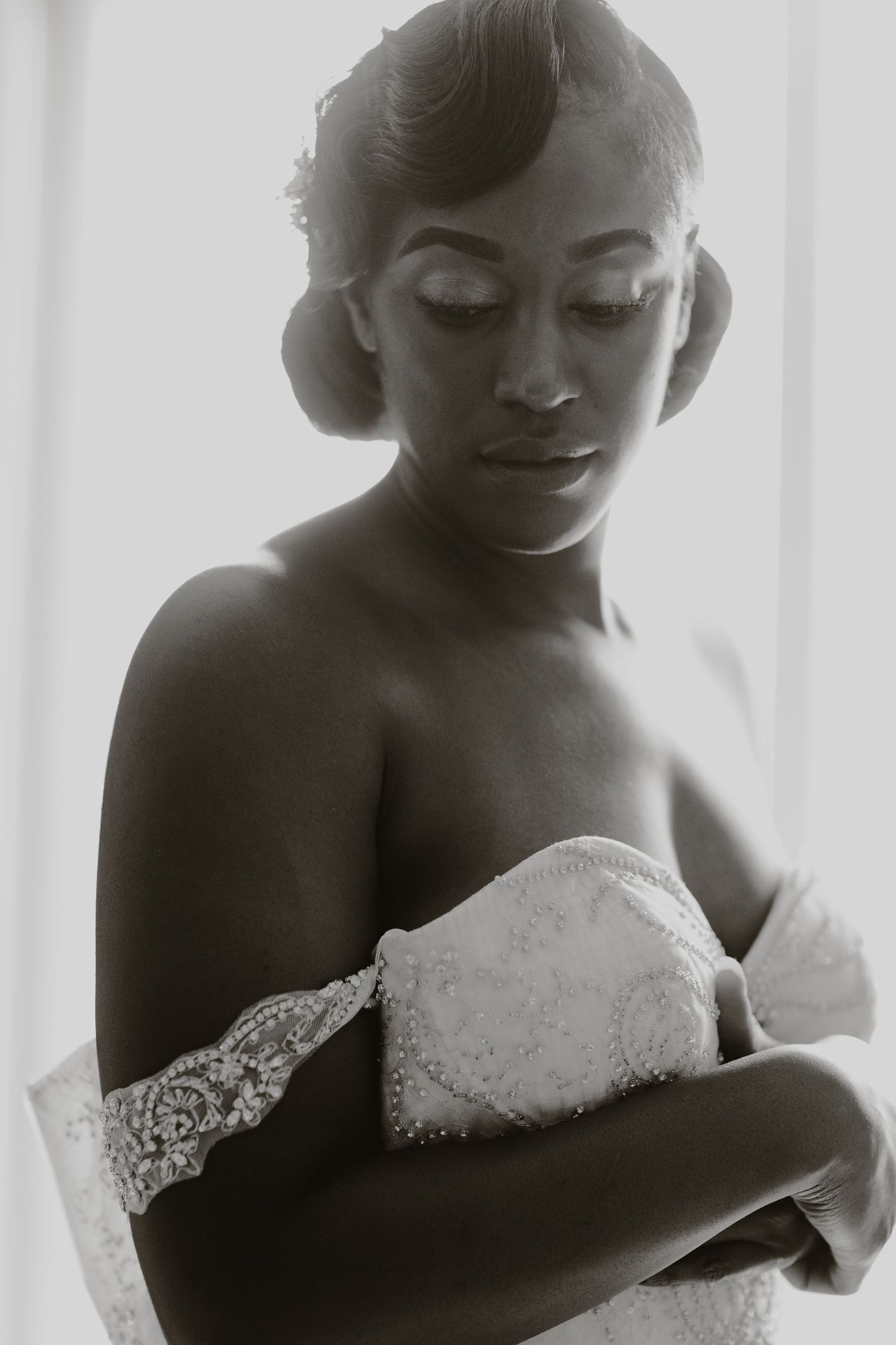 Elegant bridal portrait in classic vintage style featuring lace and delicate details.
