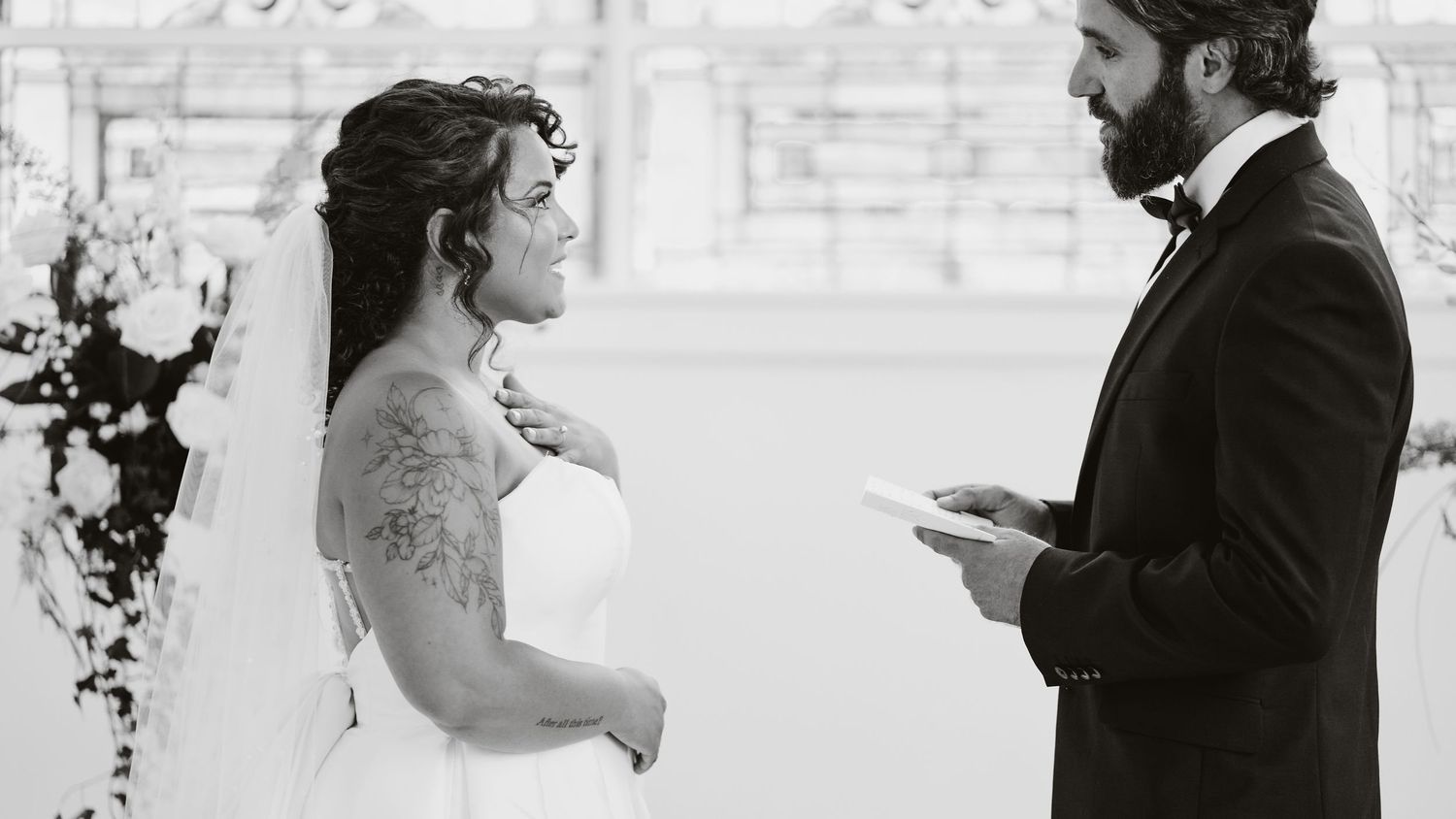 Black and white panoramic series showing wedding couple's first look reactions.