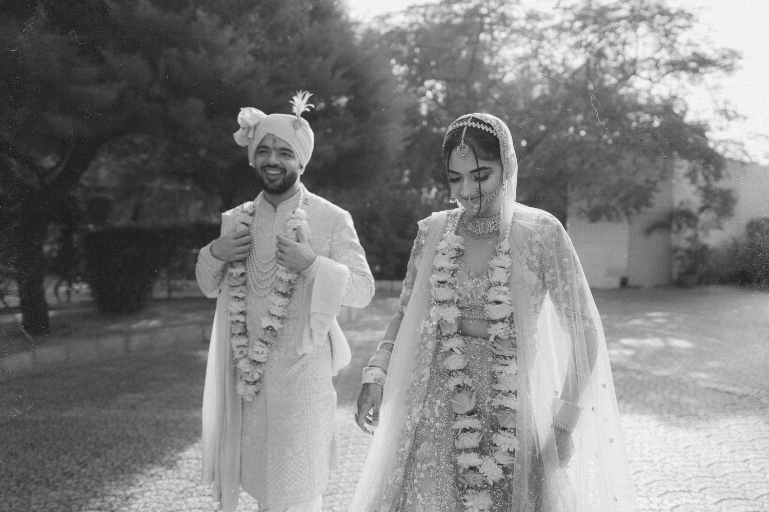 A series of black and white vintage photographs showing people posing in formal attire at a special occasion.