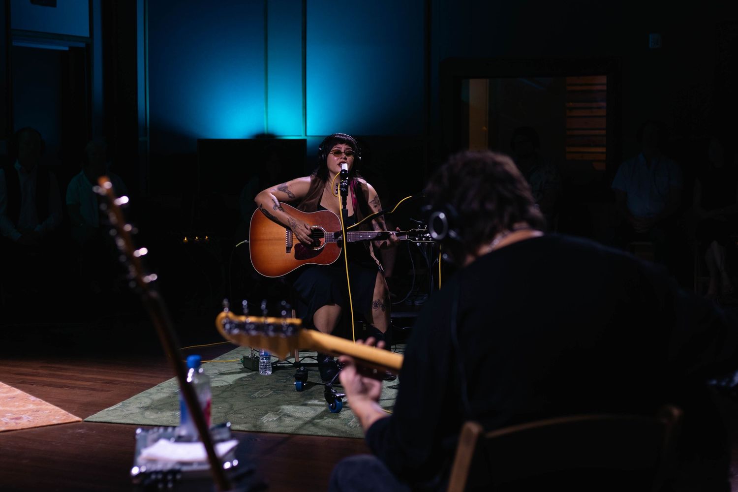 Kalyn Fay of Tulsa, Oklahoma, playing guitar, and singing in a live recording session at The Church Studio