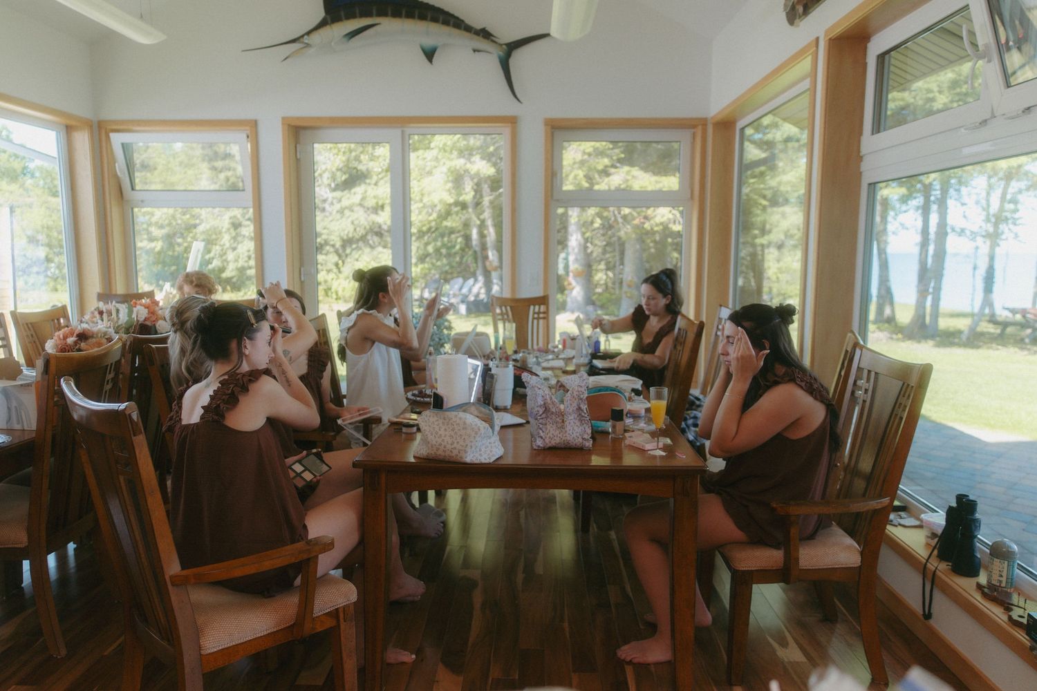 bridesmaids getting ready at a wedding on lake superior
