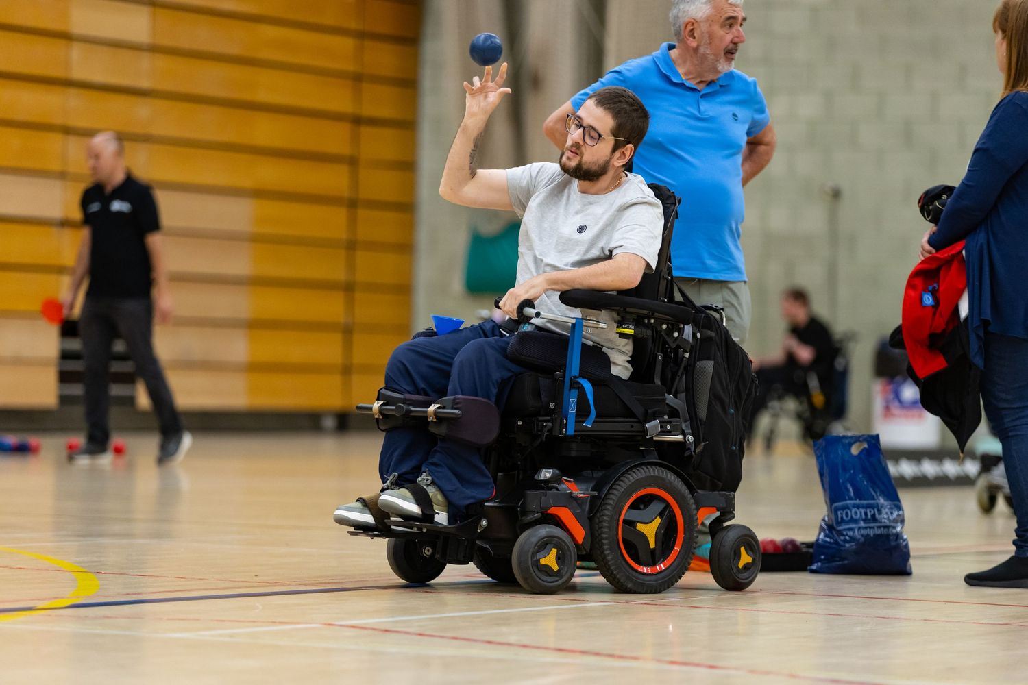 mid swing of boccia player
